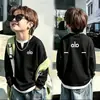 Camiseta de manga larga de punto gofre para niños, nuevo estilo primavera y otoño 2026, suéter para bebé, camiseta de dos en uno de moda para niños mayores