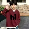 Nova blusa de malha waffle para meninos, estilo duas peças falsas, de manga comprida, para primavera e outono, adequada para crianças mais velhas e bebês, estilo coreano, simples e versátil