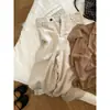 Los populares pantalones anchos de Tencel y lino de estilo 'old money' de este año para mujer son holgados, estilizan, versátiles y casuales para el verano.