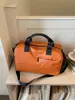 Bolso de mano grande de viaje transfronterizo nuevo, color naranja-marrón retro, adecuado para el gimnasio, para ir al trabajo y se puede llevar como bolso de hombro o bolso cruzado