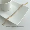 Pulsera minimalista y elegante con circonitas para mujer, con un diseño lujoso de inspiración francesa con diamantes de corte cuadrado, creando un look sofisticado y multicapa