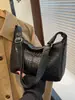 Bolso de axila para mujer modelo nuevo 2026 transfronterizo, bolso de hombro para mujer versátil de moda de alta gama, estilo casual vintage de otoño e invierno