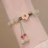 Pulseira de Imitação de Jade Hetian Natural Transfronteiriça, Novo Estilo Pulseiras Trançadas para Casal, Presente Dourado Feminino, Design de Prata de Nicho Atacado