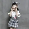 Camiseta de Verano 2019 para Niñas Estilo Coreano Linda Mangas de Cuerno Manga Corta Falda de Tirantes a Cuadros Conjunto de Dos Piezas 18675