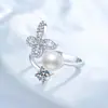Anillo de plata de ley S925 con moissanita para mujer, perla de agua dulce natural, mariposa, anillo de lujo ligero de alta gama, ajustable, al por mayor
