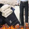 Pantalones de hombre forro polar de cordero invierno forrados de polar no se atan cómodos pantalones elásticos para hombre no sueltan pelusa jeans rectos