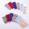 En Stock Colorido Tres Filas Dos Botones Acero Inoxidable Poliéster Negro y Blanco Sujetador de Pecho Hebilla de Tres Filas Fabricante