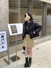 Falda corta de lana Baishiwang estilo A otoño e invierno diseño de un solo botón falda de lana versátil adelgazante