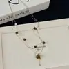 Collar de Calabaza con Piedra Ojo de Tigre de Doble Capa para Mujer 2026 Nuevo de Moda Lujo Ligero Gama Alta Cadena de Suéter con Cuentas Nicho Moda