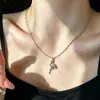 """Flamingo Dourado" Colar clavícula com flamingo cravejado de diamantes, gargantilha de nicho, acessório versátil para uma vibe de verão"""