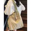 Mochila de cordón de moda para mujer 2026 Primavera Nueva Bolso de mano simple para hombro Mochila de viaje de gran capacidad