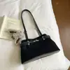 Bolso de hombro de alta calidad estilo coreano, nueva colección otoño 2026, bolso retro de gamuza para debajo del brazo, moderno bolso baguette de color liso