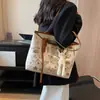 Bolsa grande de alta qualidade estampada feminina nova moda 2024 versátil bolsa de ombro estilo estrangeiro bolsa de compras para estudantes universitários