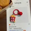 Llavero colorido con diseño de "explosión de calorías", con campanitas pequeñas, hamburguesa, cerveza, papas fritas, palomitas de maíz y otros dijes con temática de comida, adecuado como accesorio para estudiantes