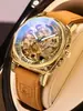 Reloj de lujo para hombre más vendido transfronterizo con relieve dorado, esfera calada a doble cara y correa de cuero con números romanos