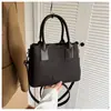 Bolso de mano pequeño vintage de alta gama para mujer de comercio exterior, nuevo y elegante bolso cubo de nicho, gran capacidad, bolso de hombro único cruzado