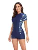 Europa y Estados Unidos transfronterizo nuevo bikini traje de baño de una pieza manga corta con cremallera conservador traje de baño para surfear para mujer traje de baño para mujer