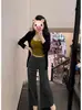 Otoño e invierno sexy chica caliente camisola ajustada para mujer cárdigan versátil adelgazante pantalones casuales de rayas negras conjunto de tres piezas para mujer