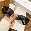 Gafas de Sol Curvas Sin Marco Y2K Nuevas Miuji Transfronterizas para Mujer Sexy de Gama Alta Versátiles para Fotografía Callejera Venta al por Mayor