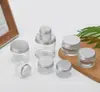 Atacado do fabricante frascos transparentes de vidro para dispensar creme com tampas de vedação, frascos cosméticos vazios com tampas de alumínio de borda enrolada, frascos de creme
