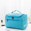 Bolsa de aseo con gancho de tela Oxford catiónica Bolsa de aseo tipo almohada Bolsa de almacenamiento Bolsa de aseo de viaje Bolsa cosmética portátil