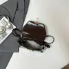 Bolsa feminina transfronteiriça de grande capacidade 2026 nova bolsa de mão com fecho vintage, bolsa de ombro e transversal versátil de alta moda