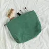 Saco cosmético de veludo cotelê transfronteiriço feminino de grande capacidade batom maquiagem mudança de celular embreagem portátil saco de armazenamento de cor sólida
