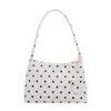 Elegante bolso pequeño de lunares para mujer, nuevo diseño de nicho transfronterizo 2026, bolso de hombro, casual, para ir al trabajo, bolso de mano para el día a día