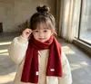 Bufanda de punto suave y versátil de color liso para niños y niñas, que realza el ambiente invernal, favorecedora para el cutis, calentador de cuello de lana para nuevos estudiantes