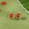 Anillo de Lujo Ligero de Plata de Ley S925 Chapado en Oro Ágata Nan Hong Rojo Agua Patrón de Flor Hueca Ruyi Redondo para Mujer