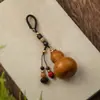 Pingente Chaveiro de Cabacinha Natural Antiga Folu Requintado Acessórios Criativos para Pendurar em Bolsas de Homem e Mulher Presente com Semente Torcido à Mão