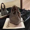 Bolso de mano con tachuelas de diamantes transfronterizo para mujer, nuevo bolso tipo cubo retro francés 2026, bolso de hombro casual de alta gama