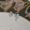Brincos de tarraxa elegantes Dongdaemun Coreia do Sul feminino agulha de prata S925 pingente de laço totalmente cravejado de diamantes brincos de luxo leve