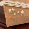 Pendientes Populares Únicos de Flor y Perla para Mujer 2025 Pendientes Nuevos Diseño de Nicho Lujo Accesible Pendientes Elegantes de Gama Alta