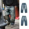 Textura de pintura manchada desgastada, estilo nuevo de alta resistencia, lavado, retro a la moda, otoño 2026, jeans unisex de corte holgado