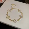 Pulseira Flor Banho de Ouro 18K Real com Zircônia, Luxo Acessível, Sensação de Alta Qualidade, Moda de Nicho, Joia de Mão Versátil para Mulheres