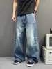 Silueta urbana casual, efecto de bigote lavado, jeans de corte curvo holgados, nuevos pantalones anchos relajados estilo americano para hombre y mujer