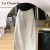 Calça Jeans Wide Leg Scimitar Branca para Mulheres Outono 2025 Tendência Versátil Nova Cintura Alta Emagrecedora Reta Calça Foice