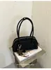 Bolsa de mão com padrão trançado de nicho para comércio exterior para mulheres, nova bolsa estilo retro bowling, bolsa versátil de ombro e para usar sob o braço, moderna