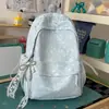 Mochila cielo estrellado azul brumoso suave, estilo coreano suave y linda, con un ambiente dulce y encantador, perfecta para salidas y sesiones de fotos
