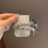 Grampo de Lã com Strass de Luxo Leve para Mulheres Outono e Inverno Estilo Coreano Presilha Lateral Estilo Doce e Cool Grampo Lateral de Laço com Diamante Acessórios de Cabelo
