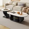 Mesa de centro moderna y elegante de pizarra en forma ovalada color crema para salas de estar pequeñas, uso doméstico simple, juego de modelo nuevo