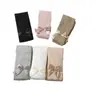 Colección de primavera y otoño transfronteriza: Leggings infantiles con diseño estilo princesa, versátiles para usar como prenda exterior, con rayas verticales y un gran moño, adecuados para niñas