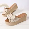 Sandalias cruzadas de punta abierta con plataforma gruesa para mujer, de estilo europeo y americano, a la moda para uso exterior, nuevas sandalias de playa de verano 2026, chanclas casuales