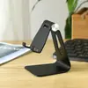 Suporte de Celular de Liga de Alumínio Dobrável Único Suporte Universal de Mesa para Celular e Tablet logo Suporte Preguiçoso de Metal