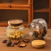 Pote Selado com Relevo Vintage Garrafa de Barriga Grande Pote Redondo Doméstico para Armazenamento Embalagem de Grãos Garrafa de Vidro Transparente Garrafa Vazia Venda por Atacado