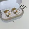 Pendientes pequeños de pétalos estilo fragante 2022 nuevo diseño de nicho de moda pendientes de alto sentido para mujer pendientes con pasador de plata 925