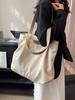 Bolsa Feminina Estilo Casual de Nicho de Luxo Verão 2026 Nova Versão Coreana Bolsa de Lona Tote de Grande Capacidade Bolsa de Ombro para o Dia a Dia