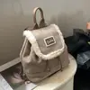 Mochila de Peluche Retro de Invierno Transfronteriza Nueva para Mujer Estilo Coreano Nueva Simple y Versátil Bolso de Empalme de Lana de Cordero para Mujer