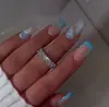 Novas Peças de Unha Manicure Pequenas Frescas Mais Vendidas Transfronteiriças 3D Estéreo Azul Francesa Cauda de Peixe Longa Amêndoa Unhas Usáveis Atacado